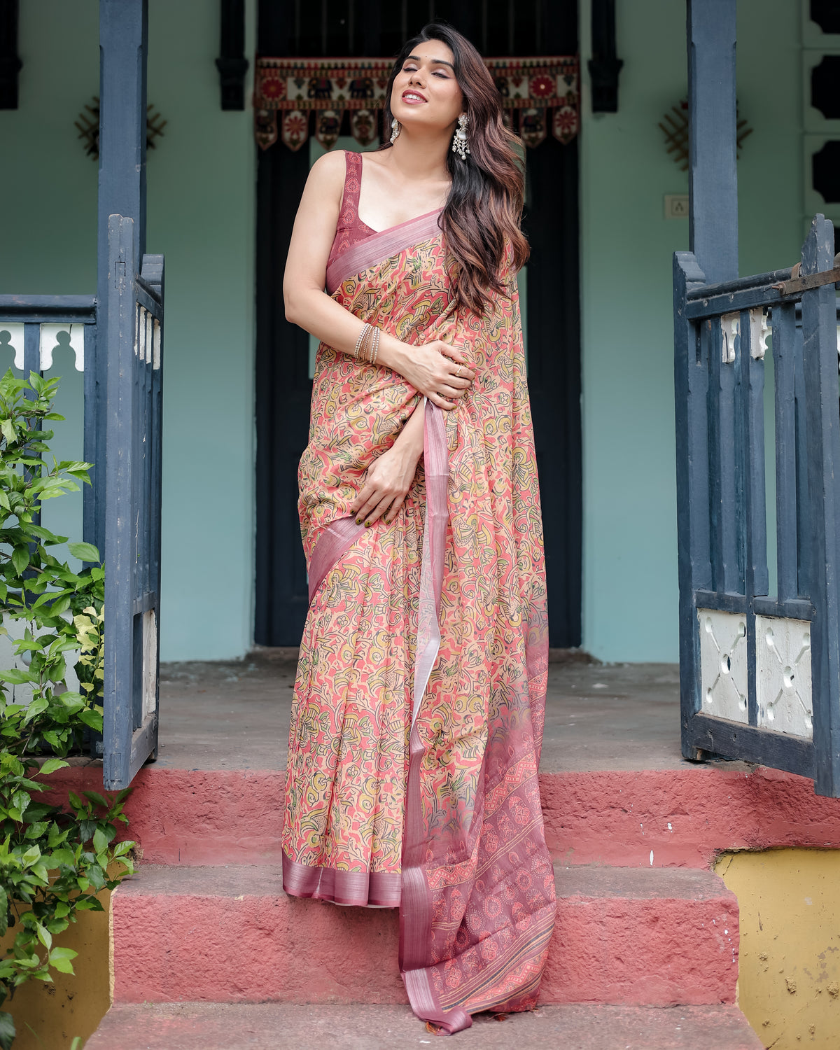Peach Pink Floral Printed Saree with Traditional Border