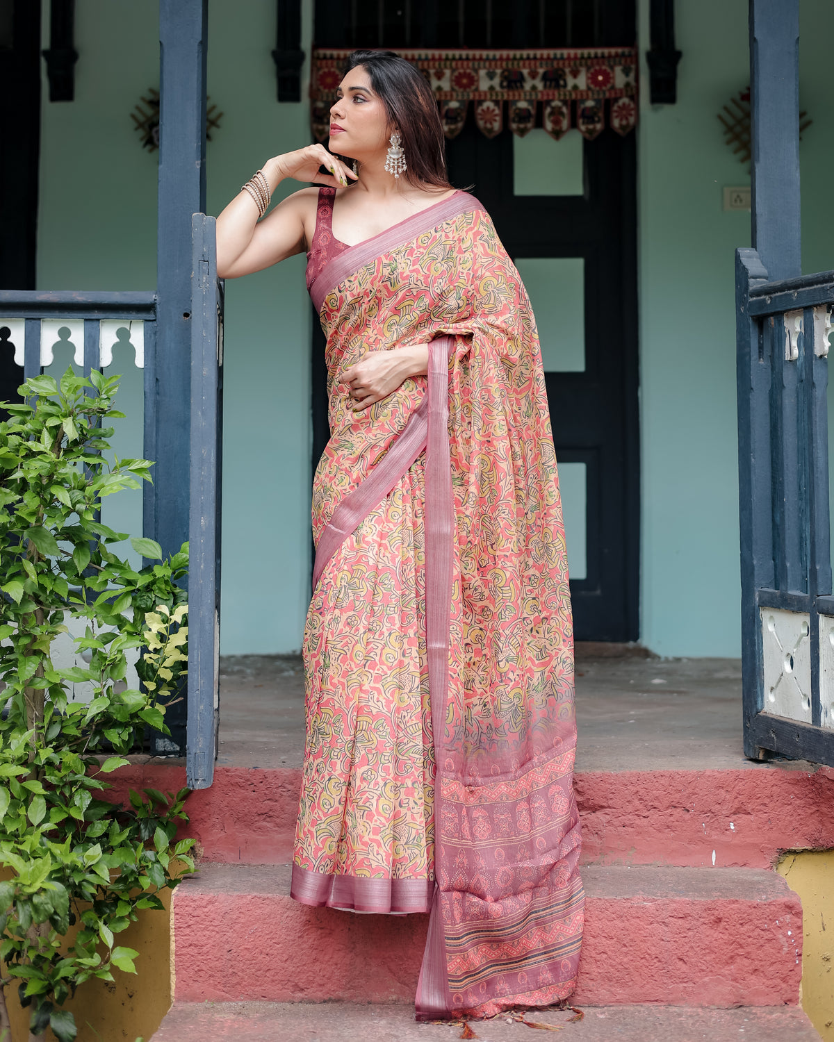 Peach Pink Floral Printed Saree with Traditional Border