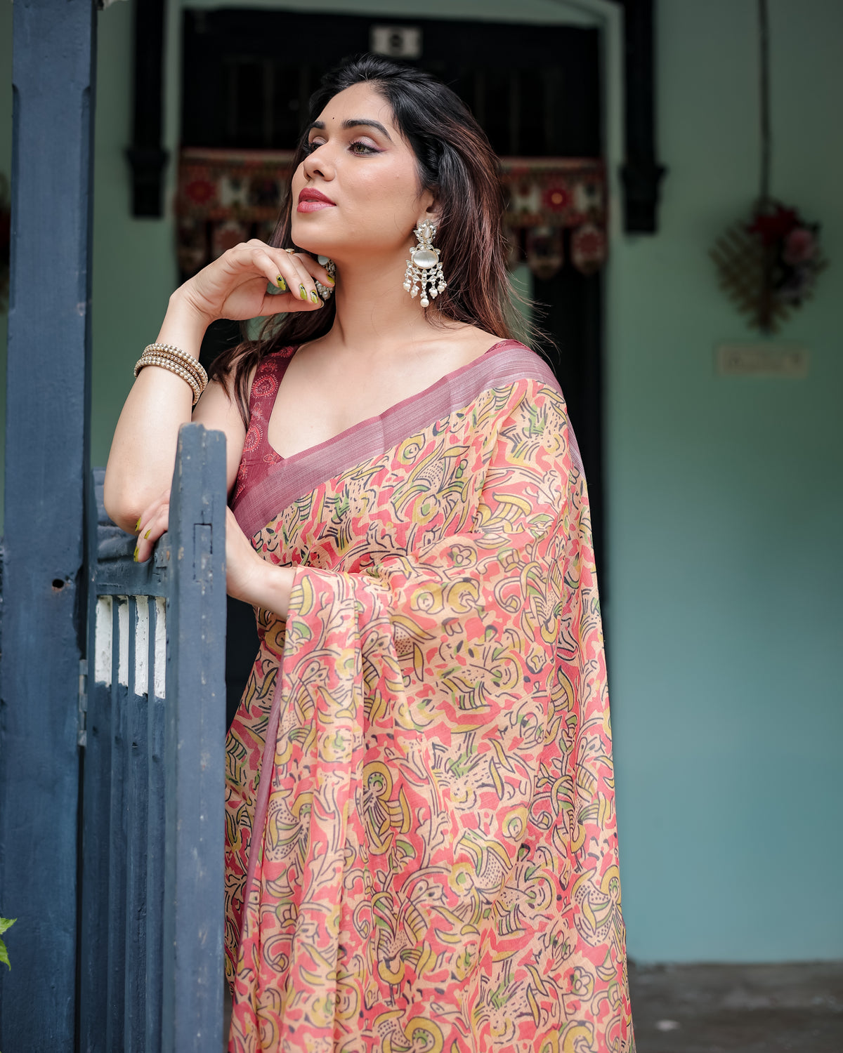 Peach Pink Floral Printed Saree with Traditional Border